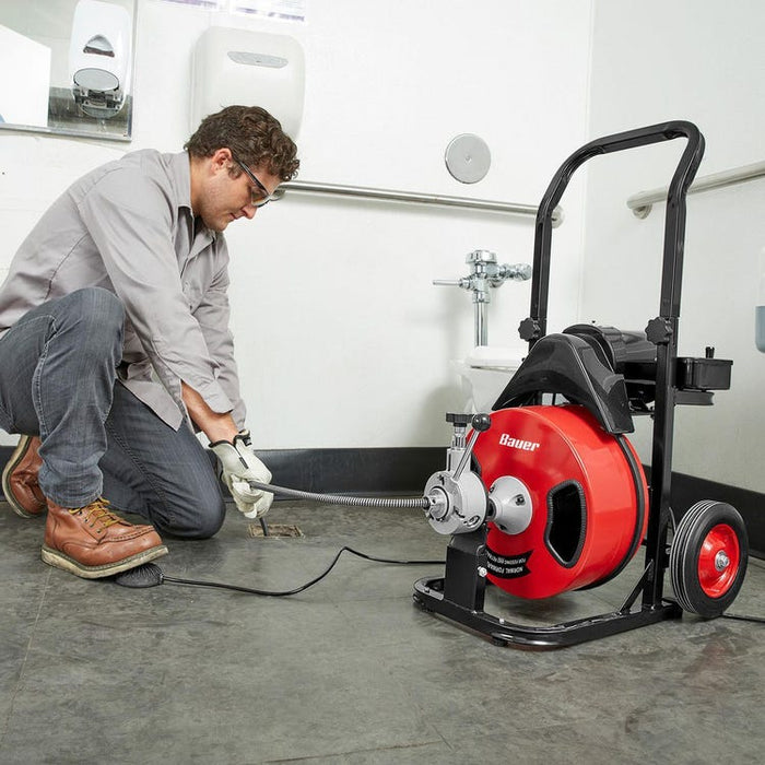 Destapador de drenajes con sonda elevtrica de 50ft, mando reversible marca Bauer.